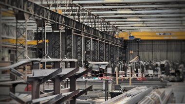 Modern metalworking facility generating wastewater with heavy metals, acids and surfactants requiring precise treatment for STM‑BREF compliance.